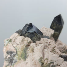 Load image into Gallery viewer, Morion Quartz and Druzy Epidote on Feldspar. 448g - The Crystal Connoisseurs

