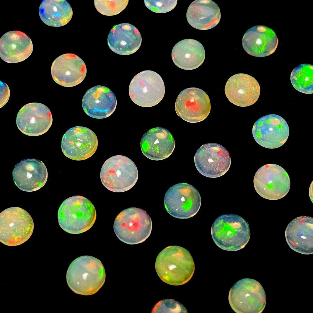 Ethiopian Opal Cabochons. Round, 5mm. - The Crystal Connoisseurs
