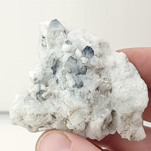 Load image into Gallery viewer, Quartz with Indicolite Tourmaline Inclusions. 89.9g - The Crystal Connoisseurs
