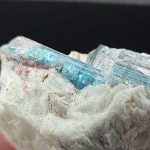Load image into Gallery viewer, Paraiba Tourmaline in Matrix. 94g - Locale: Paraiba, Brazil. Weight: 94.14grams. Dimensions: 2.3 x 1.8 x 1.3in - The Crystal Connoisseurs
