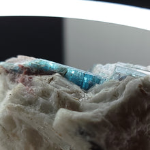 Load image into Gallery viewer, Paraiba Tourmaline in Matrix. 94g - Locale: Paraiba, Brazil. Weight: 94.14grams. Dimensions: 2.3 x 1.8 x 1.3in - The Crystal Connoisseurs

