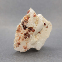 Load image into Gallery viewer, Garnet on Quartz with Albite and Mica - The Crystal Connoisseurs
