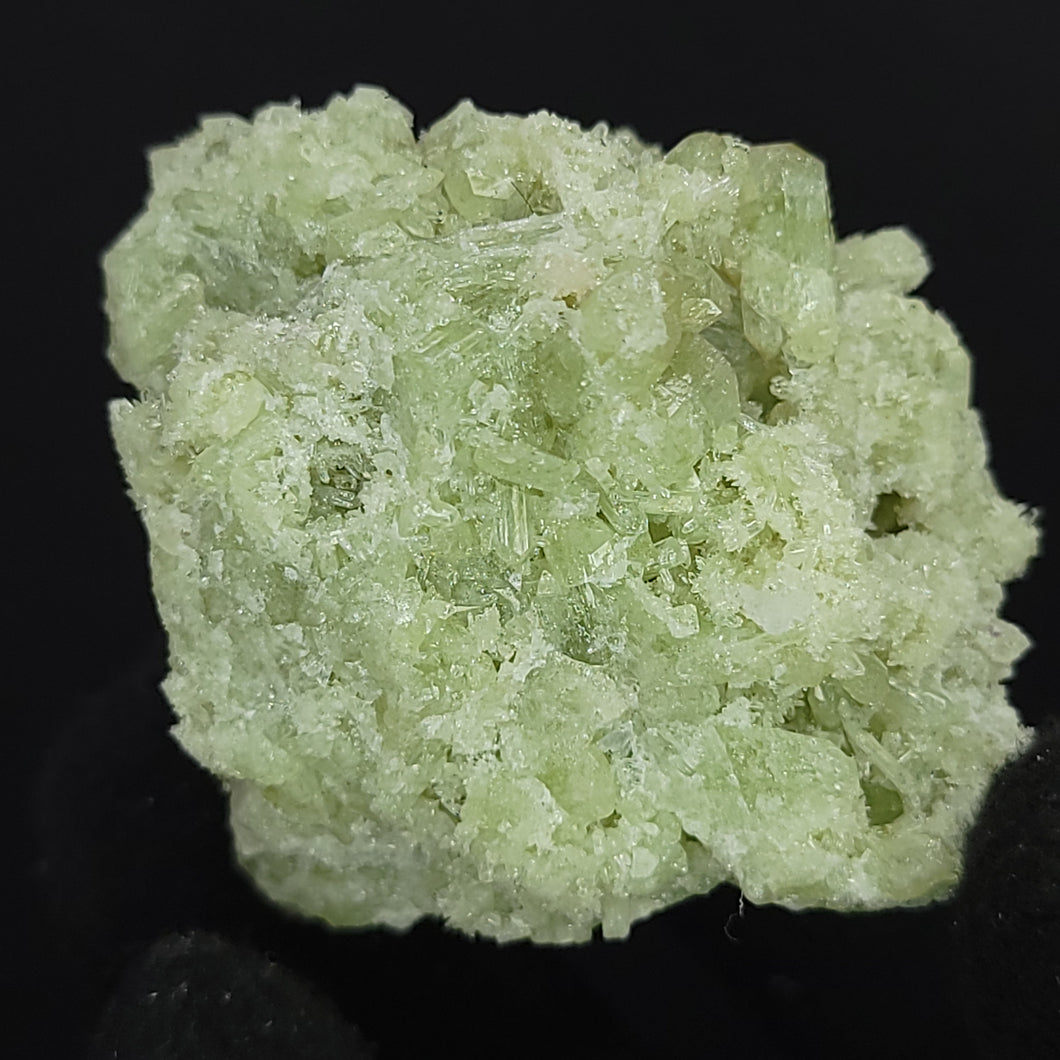 Vesuvianite Cluster. 91g - Green Vesuvianite Crystal Cluster. Locale: Unknown. Weight: 91.37 grams. Dimensions: 2 x 1.7 x 1.8in - The Crystal Connoisseurs