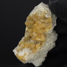 Load image into Gallery viewer, Yellow Calcite in Matrix. 42g - Locale: Unknown. Weight: 42.98 grams. Dimensions: 2 x 1.9 x 0.8in - The Crystal Connoisseurs
