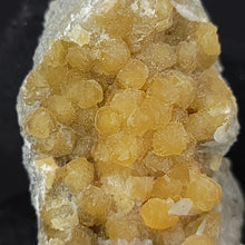 Load image into Gallery viewer, Yellow Calcite in Matrix. 42g - Locale: Unknown. Weight: 42.98 grams. Dimensions: 2 x 1.9 x 0.8in - The Crystal Connoisseurs
